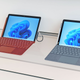 A photo of two Microsoft Surface Go 3 devices, one in red and one in gray